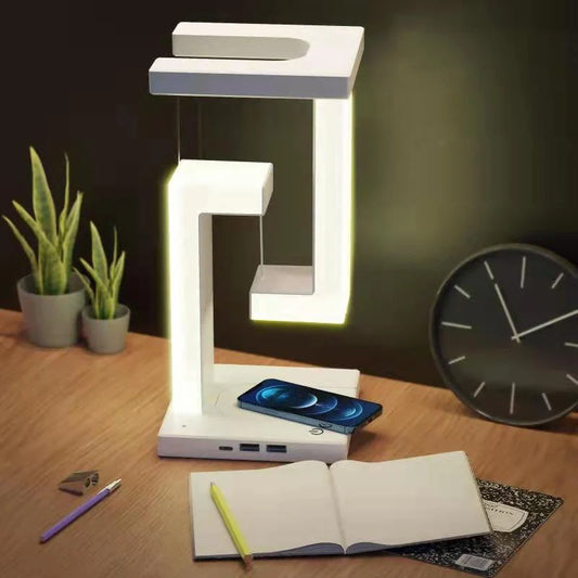 Floating table lamp with wireless charging for smartphones in modern minimalist design