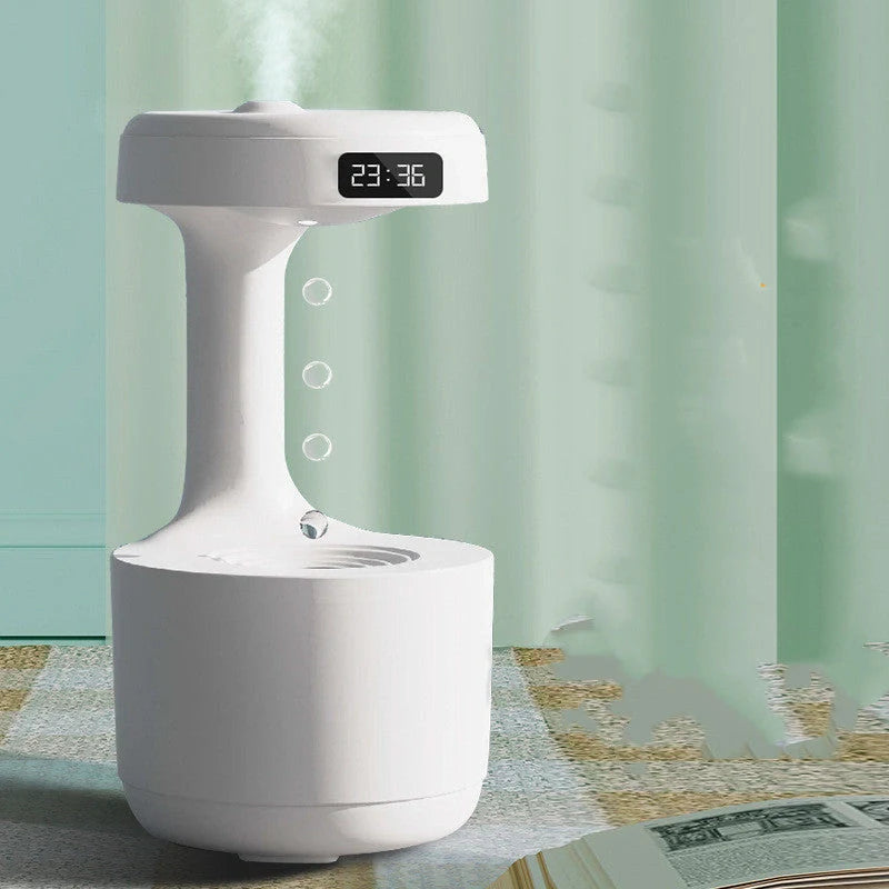Anti-gravity humidifier with LED display and aroma diffuser in white, green, and black