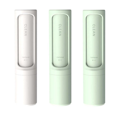 Rotating cylinder electrostatic pet hair remover brush in white, blue, green, and pink
