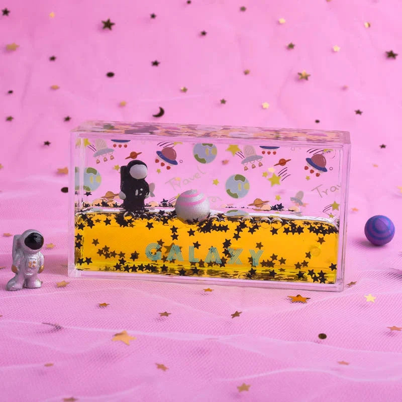 Acrylic liquid quicksand floating astronaut ornament in various colours