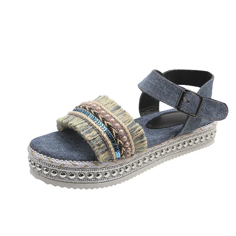 Stylish denim tassel sandals for women with thick flat sole, perfect for summer.