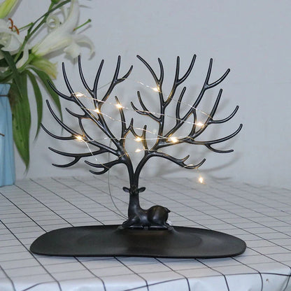 Deer Antler Jewelry Stand in white and black, displaying necklaces and earrings