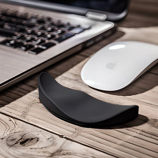Premium ergonomic wrist support cushion in white and black colours, designed to provide enhanced comfort and alignment for desk-bound users.