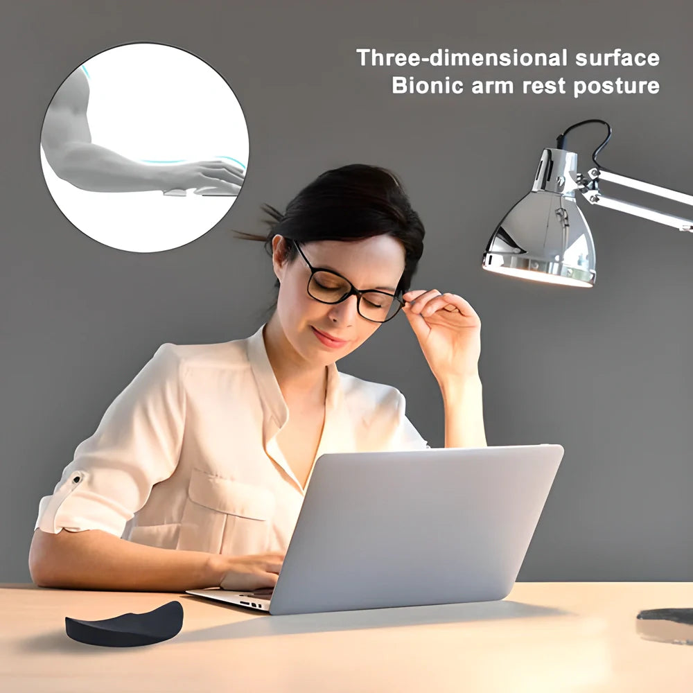Premium ergonomic wrist support cushion in white and black colours, designed to provide enhanced comfort and alignment for desk-bound users.