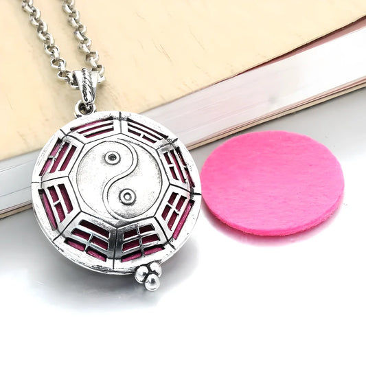 Elegant zinc alloy essential oil diffusing locket necklace with intricate fretwork design