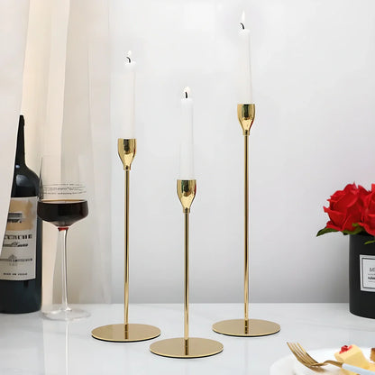Elegant European metal candle holders in various colours, including gold, silver, and black, providing a warm and inviting ambience to any living space.