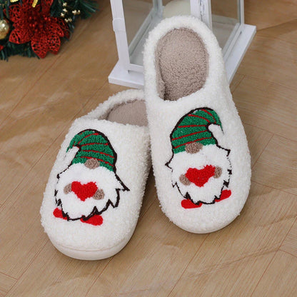 Cozy Christmas-themed slip-on slippers with a charming Santa Claus design, perfect for indoor comfort and warmth during the holiday season.