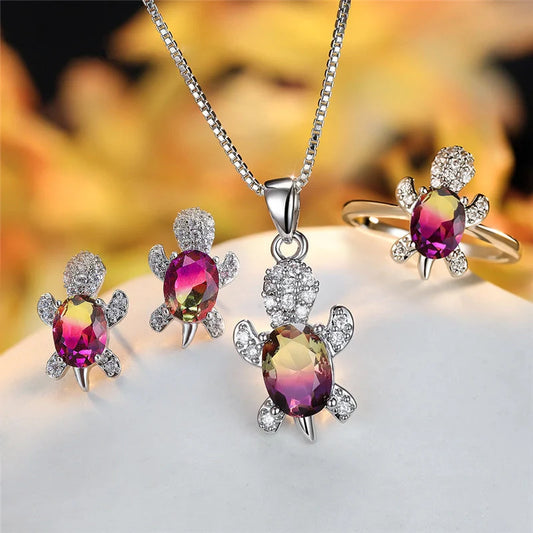 Stylish turtle pendant necklace with vibrant rainbow stones, perfect for women and children.