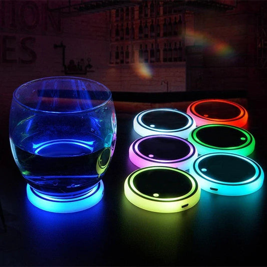 Colorful car cup holder with LED light-up coaster, solar and USB charging, and non-slip surface for ambient lighting in the car