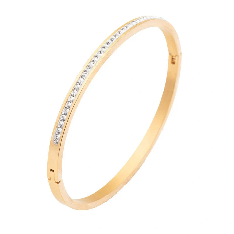 Single row stainless steel bracelet with diamond opening in gold, rose gold, or steel colour