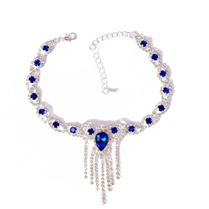 Elegant blue rhinestone tassel anklet for women, perfect for adding glamour to any outfit.