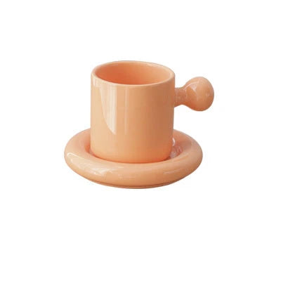 Elegant porcelain egg cup and saucer set in various colors, including white, yellow, orange, and green