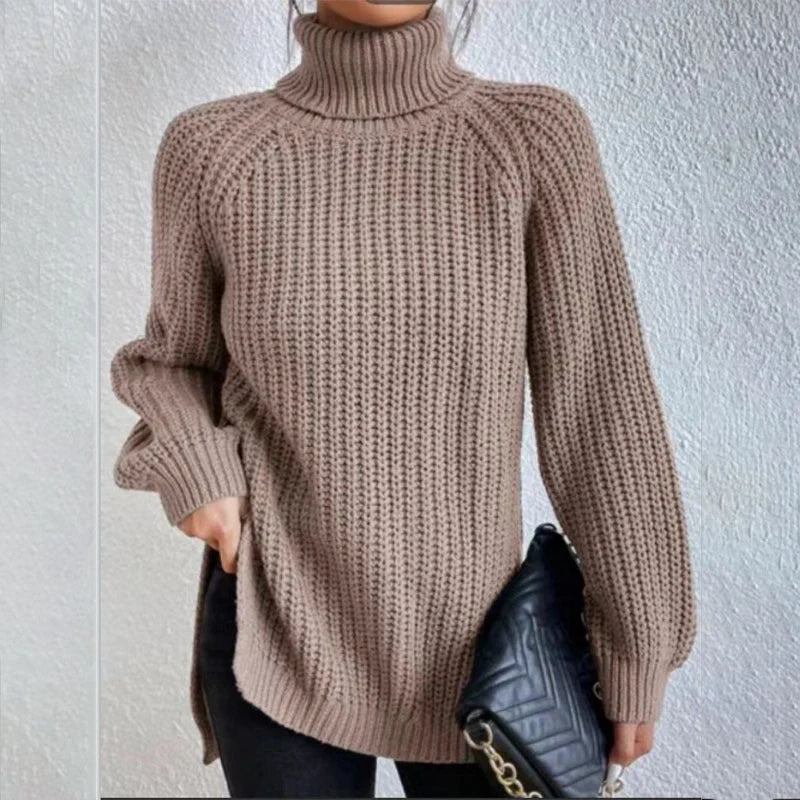 A stylish turtleneck pullover sweater with a unique split design, available in a variety of classic colours and sizes.