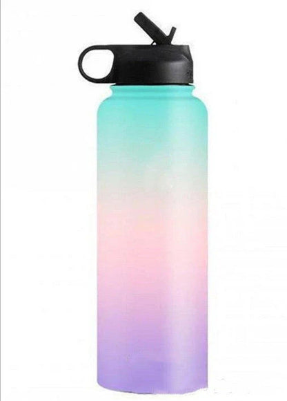 Premium stainless steel insulated tumbler with push-button lid and sleek design for outdoor adventures and active lifestyles.