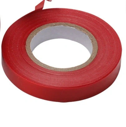 Compact garden hand tool for tying plant stems with plastic tape, measuring 300x200x100mm