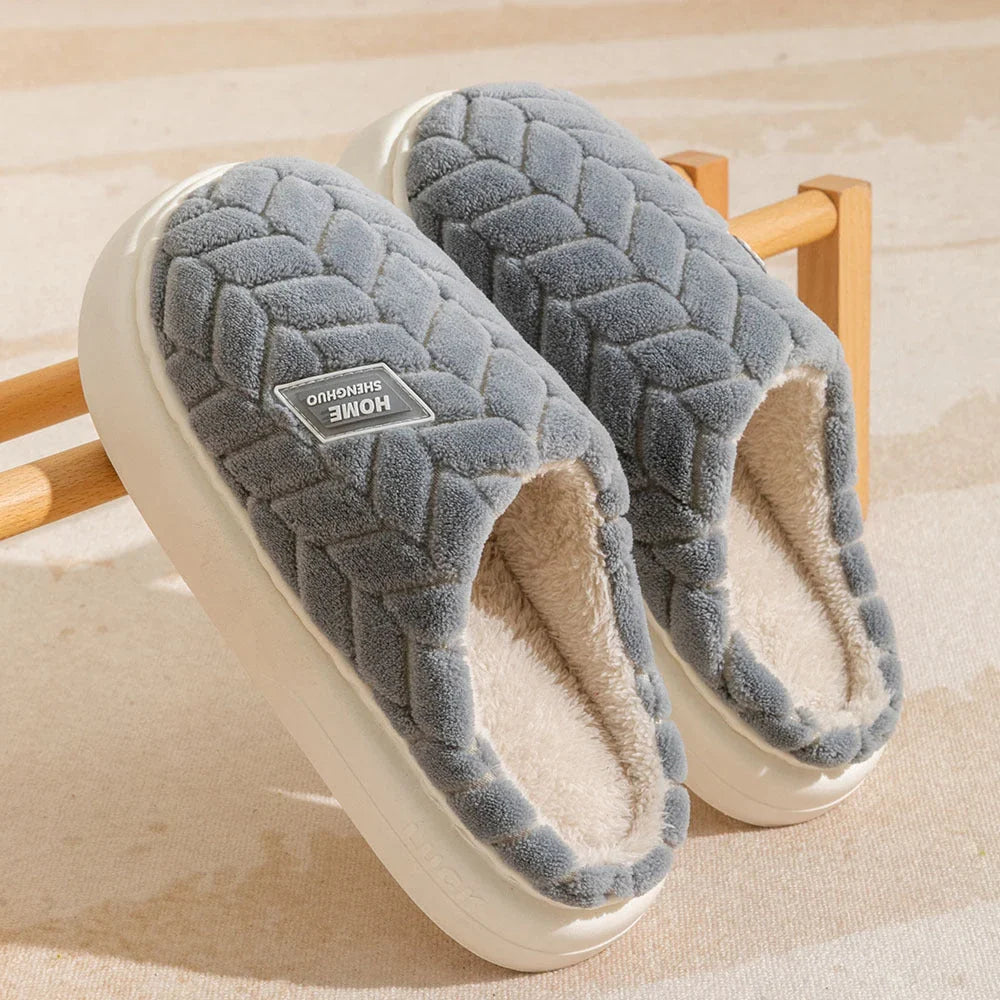 Cosy plush slippers in a variety of vibrant colours, featuring a soft fleece lining and durable non-slip sole for maximum comfort and stability.