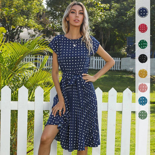 Stylish polka dot midi dress with short sleeves, pleated skirt, and hidden lining for a smooth, non-see-through fit