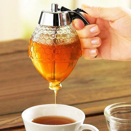 Premium acrylic honey dispenser with transparent body and precise spout for drip-free honey serving