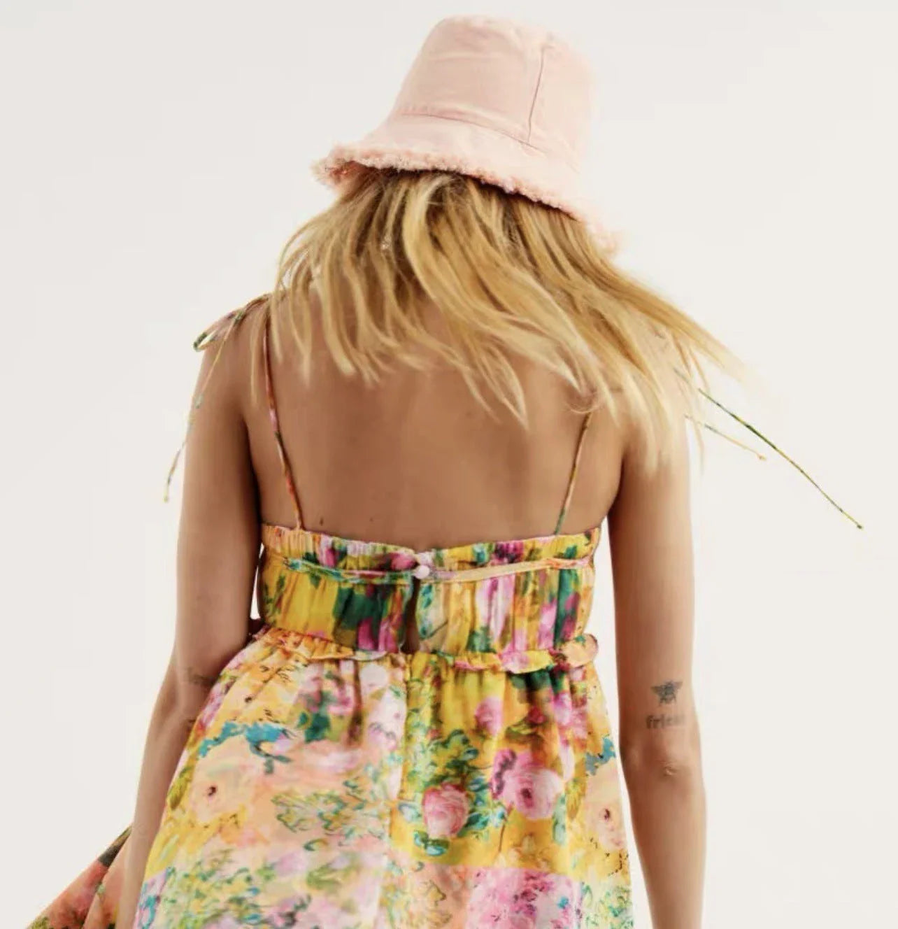 Elegant floral sundress in a variety of colors, featuring an A-line silhouette and ruffled detailing for a stylish and feminine look