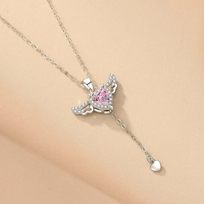 Enchanting necklace with Cupid heart and fluttering angel wings, crafted with titanium steel and sparkling zircon crystals