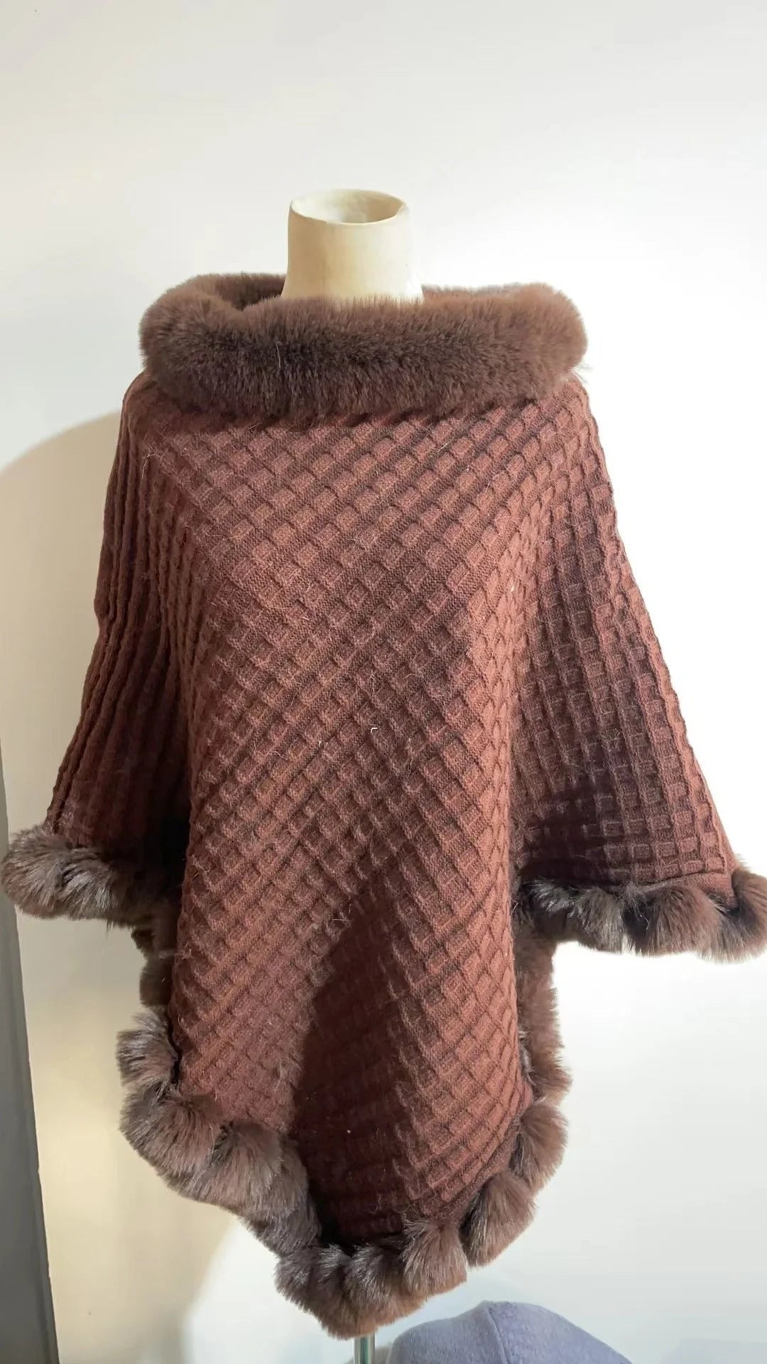 Luxurious rabbit fur wrap shawl in various colours, featuring a soft, cosy collar and a flattering cropped fit for a chic, polished look.