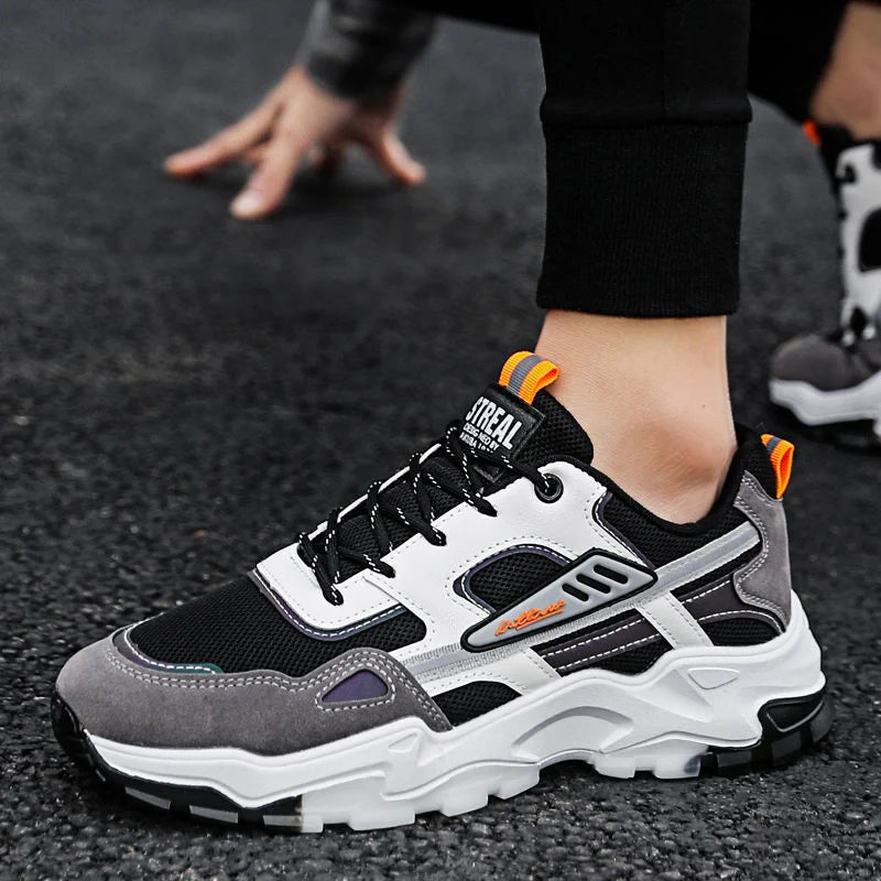 Men's black and white lace-up sneakers with breathable mesh for running