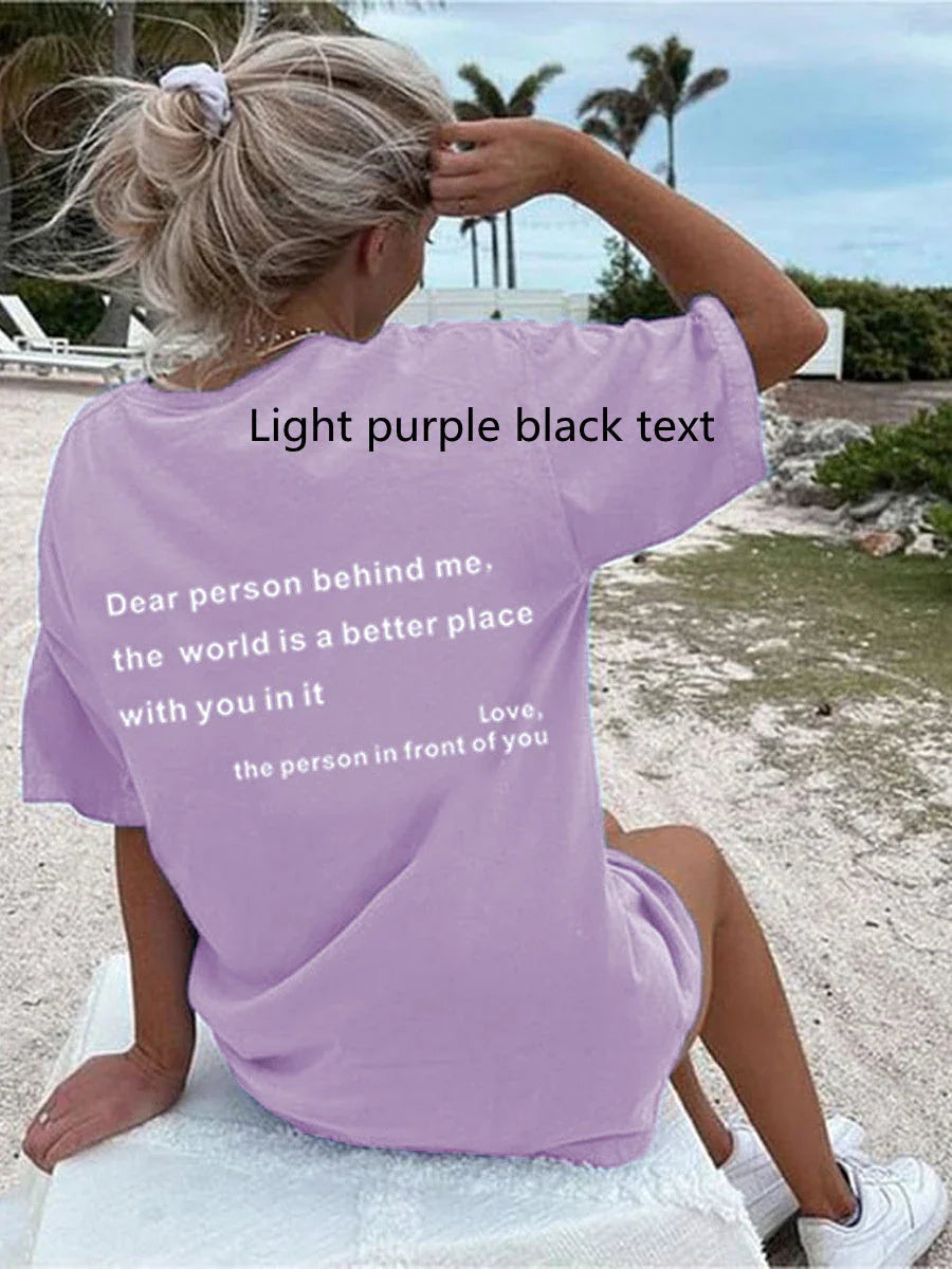 Women's graphic tee with playful slogan, available in various colors and sizes