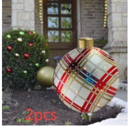 Vibrant inflatable Christmas baubles in a variety of colours and patterns, perfect for outdoor holiday decoration
