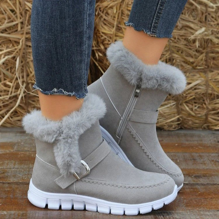 Cozy plush ankle boots in various colors with buckle detail and soft artificial fur lining