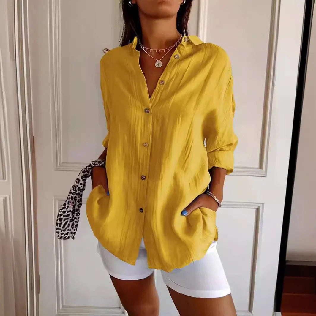 A stylish long-sleeved shirt with a pleated design, available in a variety of colours to suit any occasion.
