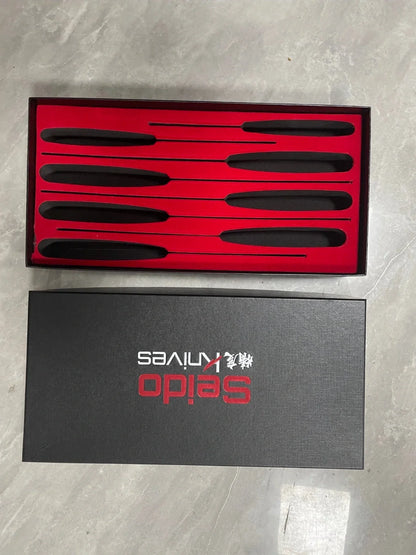 A premium 5-piece Japanese-style Seido Santoku knife set made of high-quality stainless steel, featuring a chef's knife, Santoku knife, bone knife, universal knife, and peeler