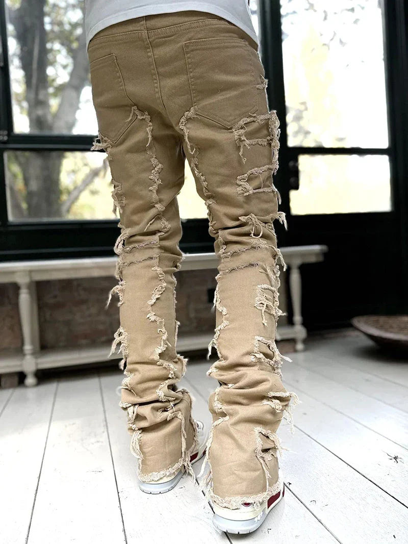 Stylish patched jeans with tight fit and stacked leg design in a variety of fashionable colors