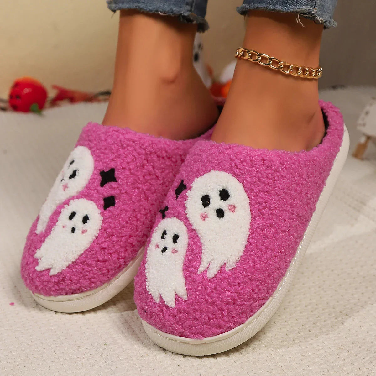 Cozy Halloween-themed cartoon ghost slippers with soft cotton construction and non-slip soles for comfortable indoor wear