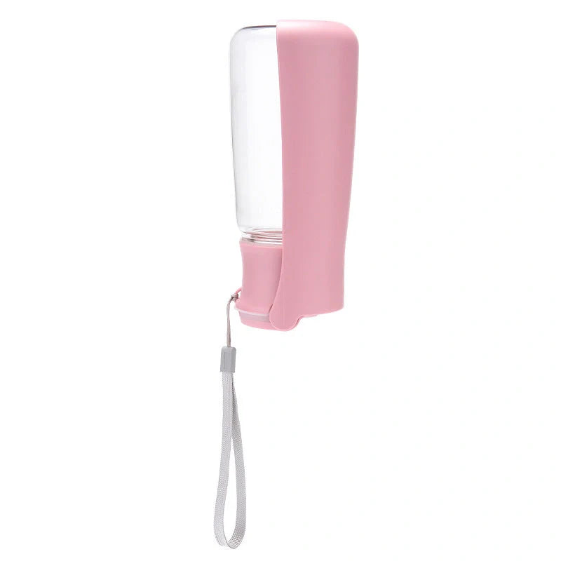 Foldable dog water bottle in blue, white, and pink, perfect for outdoor adventures with your pet.