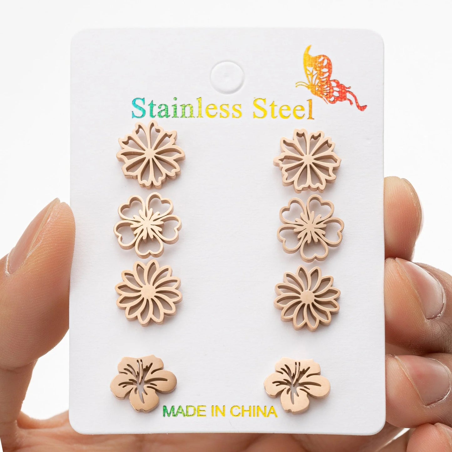 Fashion simulation stud earrings in gold, steel, rose gold, and black