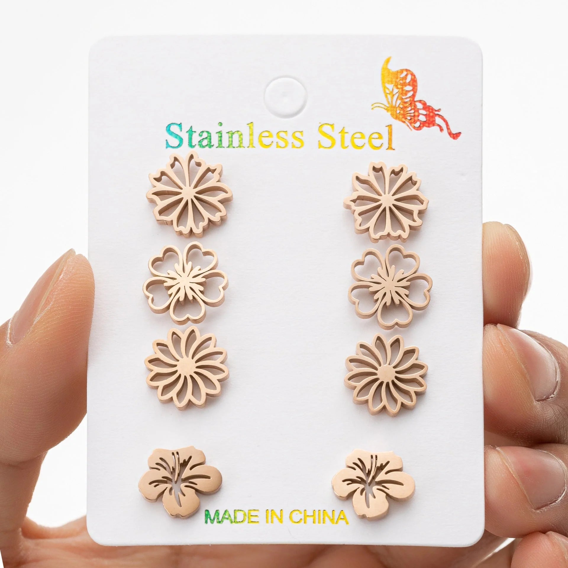 Fashion simulation stud earrings in gold, steel, rose gold, and black