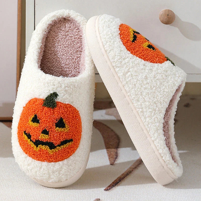 Cozy pumpkin-themed slippers with plush suede upper and non-slip rubber sole for indoor comfort