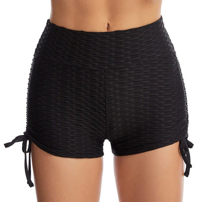 Stylish butt-lifting workout shorts with drawstring, available in various colors including pink, red, grey, navy, and black