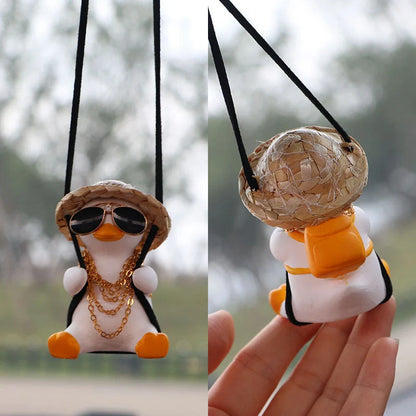 Car Swing Duck Ornament hanging from rearview mirror