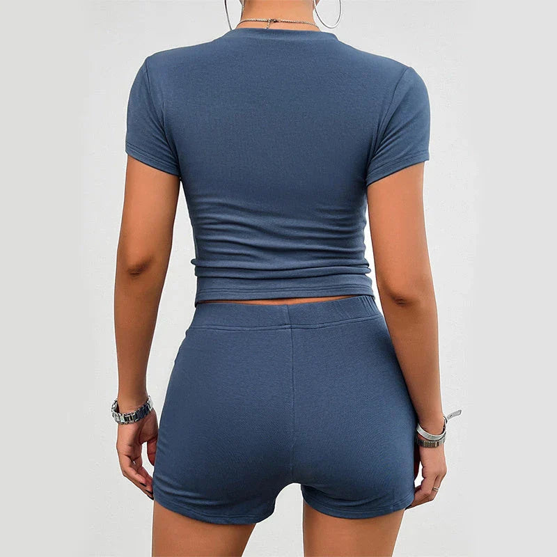 Women's activewear set with short-sleeved tee and elastic-waist shorts in various colors