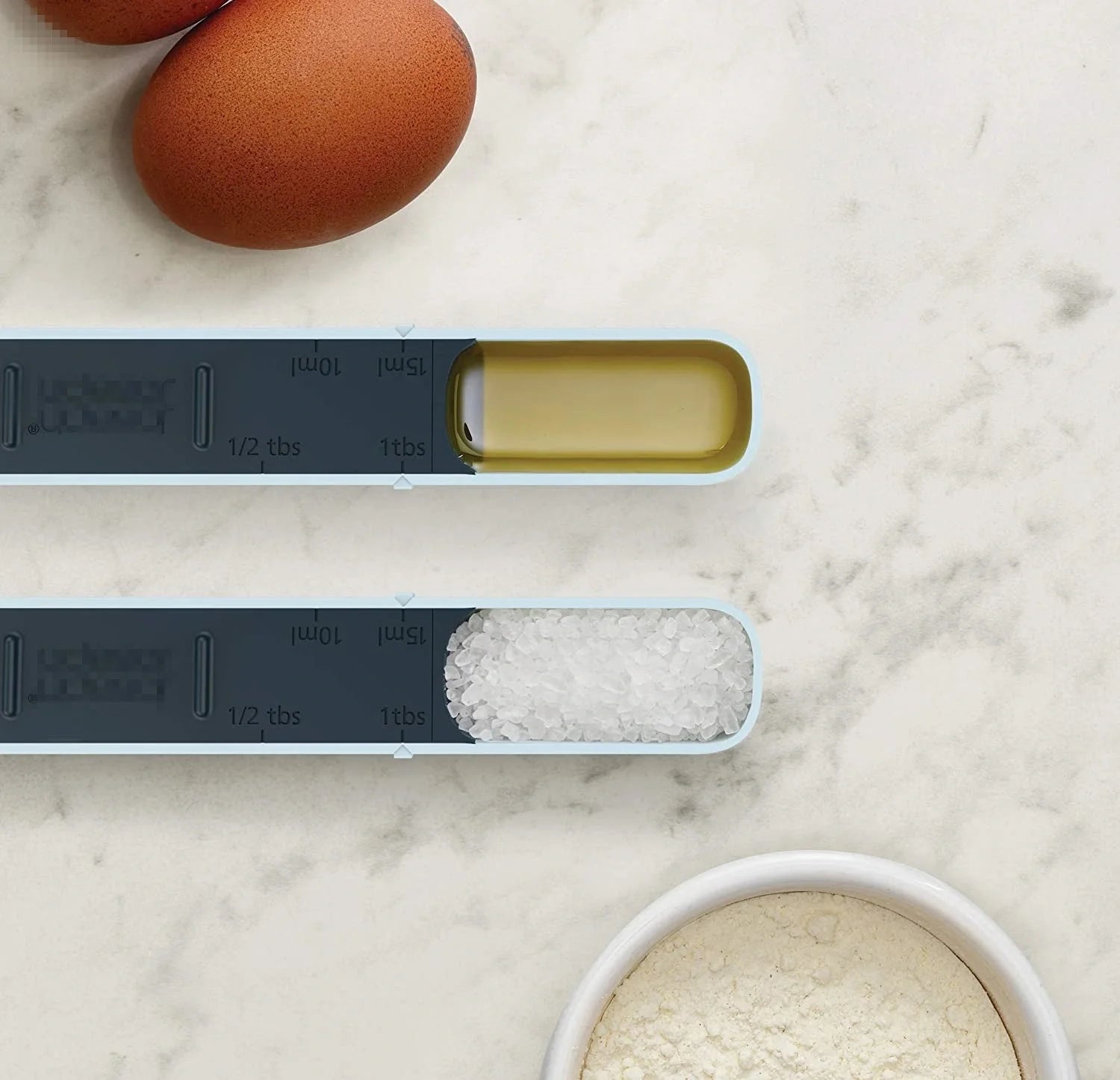 Adjustable 12-speed measuring spoon with gram scale for precise kitchen measurements