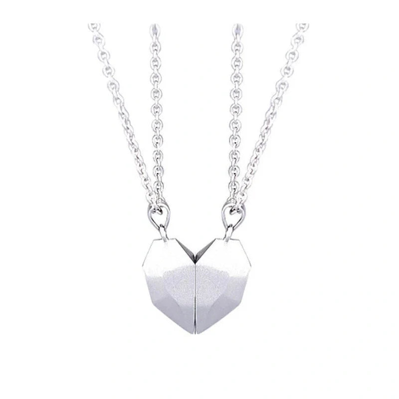 Minimalist gold-plated magnetic heart pendant couple necklace symbolising love and connection.