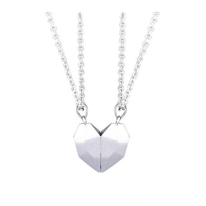 Minimalist gold-plated magnetic heart pendant couple necklace symbolising love and connection.