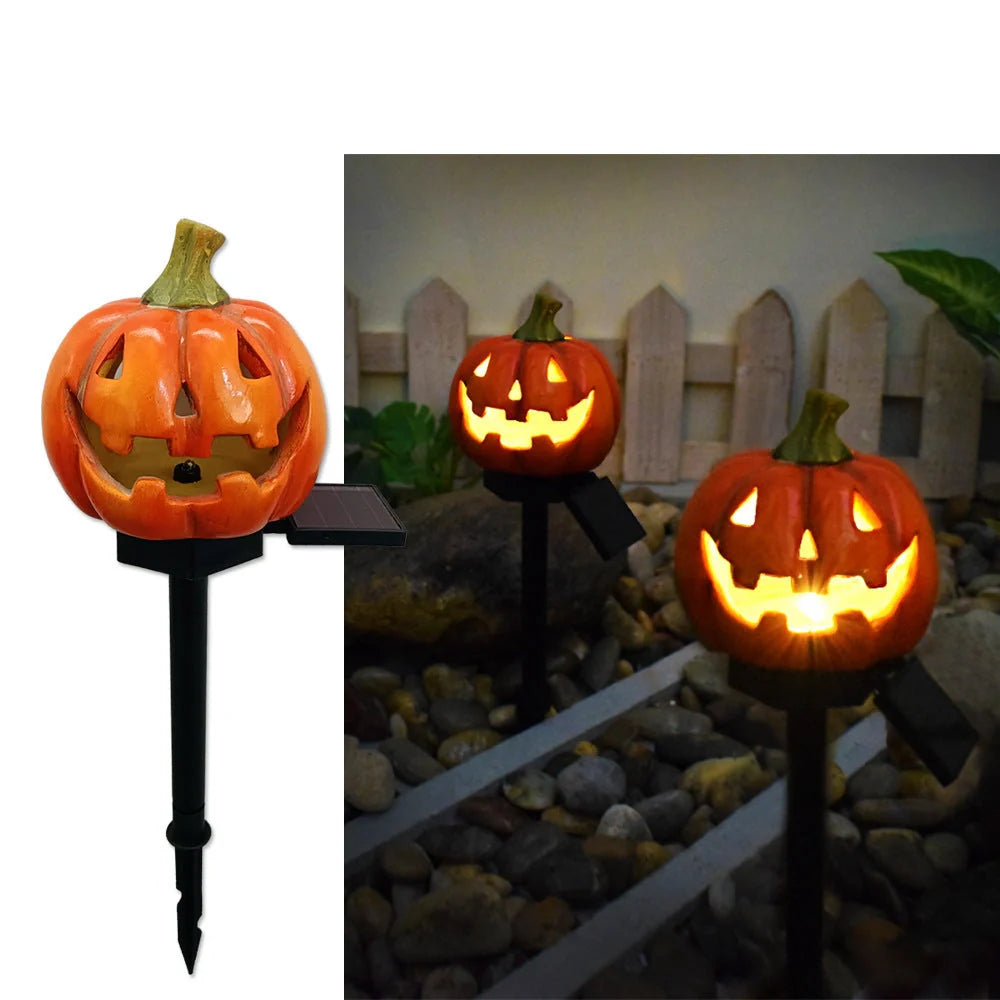 Solar-powered Halloween pumpkin lanterns in garden setting