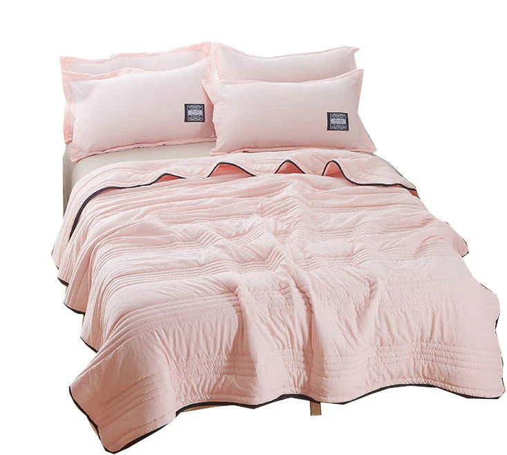 Premium cooling quilts in various colors and sizes for comfortable, temperature-regulating sleep