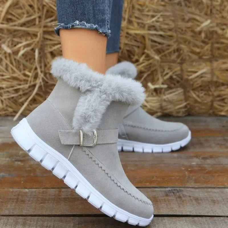 Cozy plush ankle boots in various colors with buckle detail and soft artificial fur lining