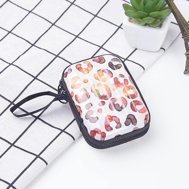 Tinplate coin purse with anime-inspired cartoon graphics, available in various stylish designs