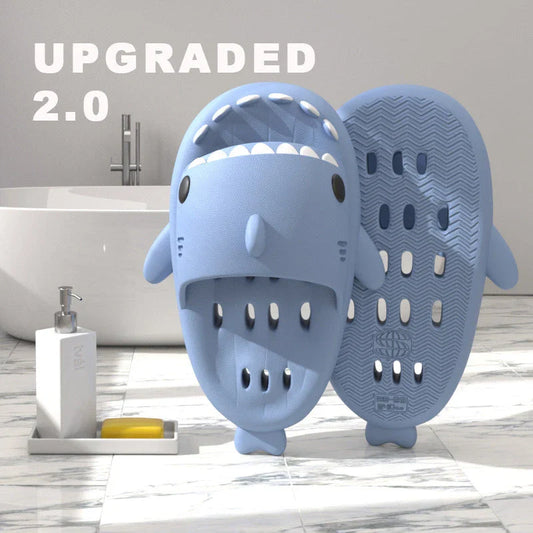 Fashionable shark-themed shower slides with drainage holes, featuring a realistic shark design, quick-drying EVA material, and non-slip traction.