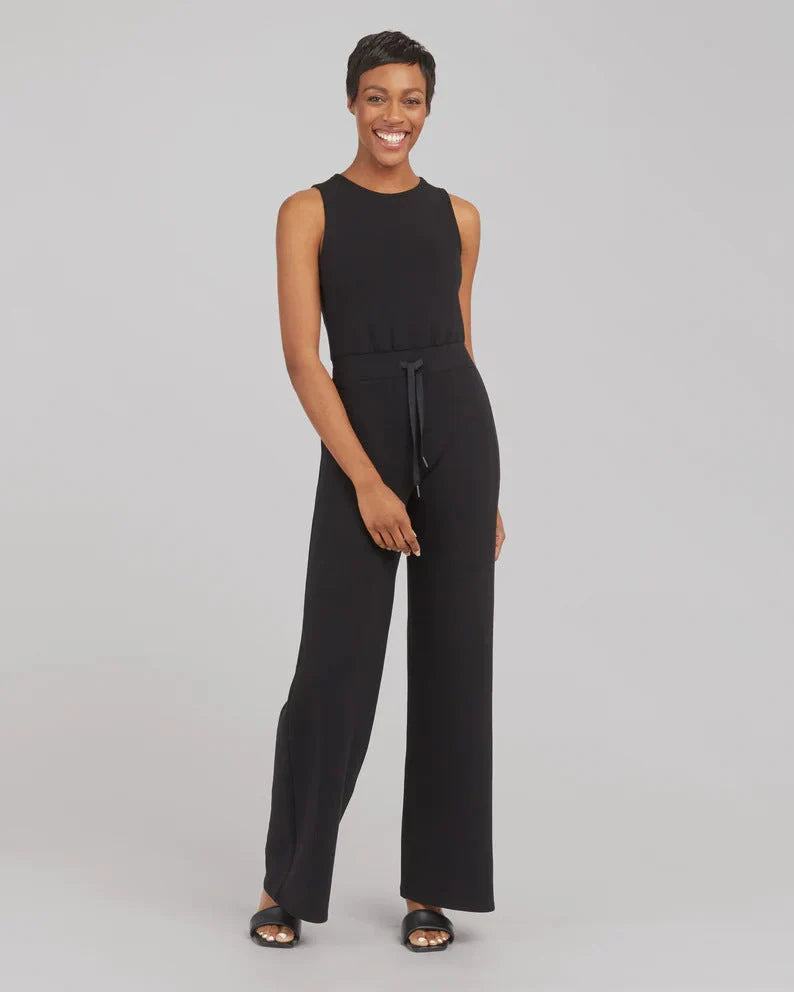 Women's lace-up jumpsuit pants in polyester, sleeveless design, available in multiple colors and sizes