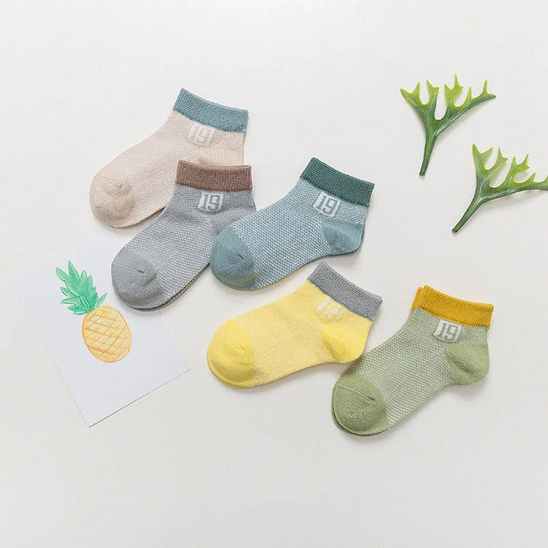 Breathable cotton baby socks in multiple colours for ages 0-9